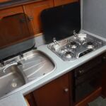 Fairline Sedan 36 - Sink & drainer with cover and hob with oven underneath